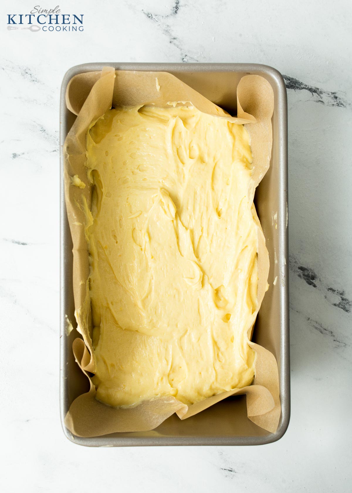loaf tin of lemon drizzle cake before entering the oven